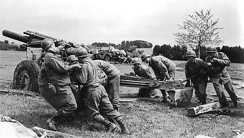 Manhandling a 155 into place